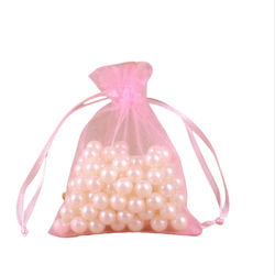 Organza-tasker med 100 smykker Pink