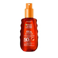 GARNIER Ambre Solaire Ideal Bronze - Huile Protectrice Sublimatrice SPF 50+ - Nourrit & Sublime Le Bronzage - Vitamine E & Beurre De Karité - Vegan & Cruelty Free - Tous Types de Peaux - 150 ml