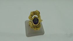 Anello in oro giallo (13,6 gr.) con tanzanite