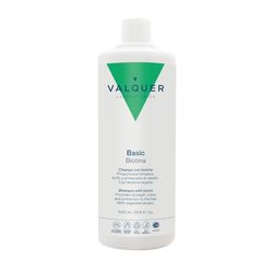 Shampooing revitalisant Valquer à la biotine et à la kératine. Effet antichute qui favorise la croissance et renforce les cheveux, leur donnant plus de volume. Contient de la vitamine B7. Vegan. 1 L.