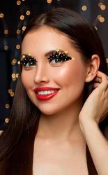 FIESTAS GUIRCA | Ciglia Nere con Stelle Dorate - Accessorio per Trucco per Natale e Capodanno - Ideale per Feste di Fine Anno e Celebrazioni - Per Donna Adulta - Nero Oro