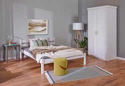 Letto in legno massiccio VILMO 140x190 cm Bianco con rete a doghe