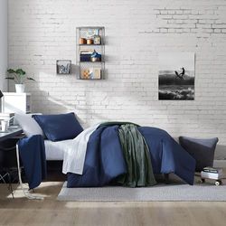 Nautica Casual Reversible Comforter Set, Includes Bonus Sham(s), Fitted Sheet, Pillowcase(s) and Laundry Bag, Polyester, Solid Navy, Twin/Twin XL
