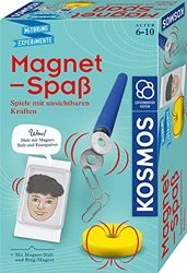 Magnet-Spaß: Male mit Magnet- Stab und Eisenpulver