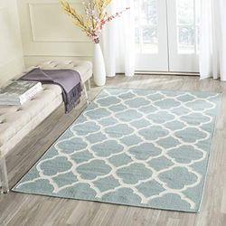 SAFAVIEH Tapis Contemporain Pour Salon, Salle à manger, Chambre à coucher - Dhurrie Collection, Tapis à poil court, Bleu et Ivoire, 122 X 183 cm