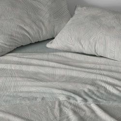 Burrito Blanco | Nacarina® lakan | 135 cm säng (+tillgängliga mått) | Design 028 | Laurelfärg (135 x 190/200 cm)