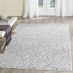 Safavieh Tapis géométrique pour Salon, Salle à Manger, Chambre à Coucher - Collection Adirondack - Poils Courts, Ivoire et Charbon - 183 x 274 cm