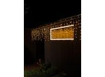 KONSTSMIDE LED-Lichtervorhang "Weihnachtsdeko aussen", Energieeffizienz: E, transparent, Dioden 400 Stk. Flammen 400 Stk., Gesamtlänge 20,27m, Lichterketten, LED Eisregenvorhang, mit weißen Globes, 400 bernsteinfarbene Dioden, LED-Lichtervorhang