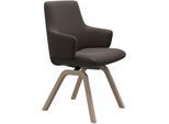 Polsterstuhl STRESSLESS "Laurel", braun (braun batick, walnuss), B:58cm H:92cm T:59cm, Leder BATICK: BATICK ist ein leicht korrigiertes, durchgefärbtes und genarbtes Möbelleder, bei dem die meisten Unebenheiten und Spuren in der Regel entfernt wurden., Stühle, Polsterstuhl, Low Back mit Armlehne, Größe L, mit schräggestellten Beinen in Walnuss