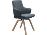 Polsterstuhl STRESSLESS "Laurel", blau (atlantic blau batick, walnuss), B:58cm H:92cm T:59cm, Leder BATICK: BATICK ist ein leicht korrigiertes, durchgefärbtes und genarbtes Möbelleder, bei dem die meisten Unebenheiten und Spuren in der Regel entfernt wurden., Stühle, Polsterstuhl, Low Back mit Armlehne, Größe L, mit schräggestellten Beinen in Walnuss