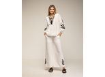 Set van broek en top met borduursel op de mouwen