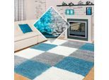 Muratap Basic shaggy geblokt vloerkleed turquoise / wit hoogpolig- 200x290