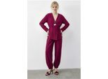 Bluse mit Gürtel und Jogginghose Set aus zwei Teilen