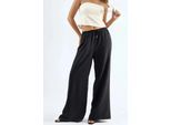 weite Hose mit Kordelzug und Taschen