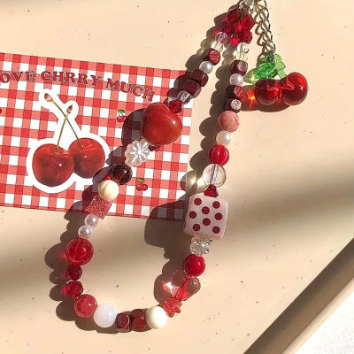 Cordón para teléfono móvil con colgante de cereza creativo, moda coreana, anticaída, antipérdida, cadena para teléfono móvil, correa de mano multiusos