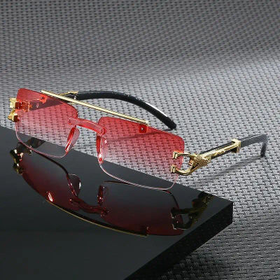 2025 Nuevas gafas de sol anti UV de pierna de leopardo de doble haz integrado con borde de corte sin marco a la moda Retro versátiles