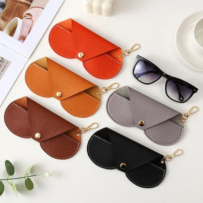 Lindo colgante de cuero PU gafas de sol gafas de lectura bolsa de almacenamiento Litchi en relieve cubierta de gafas portátil de viaje soporte para gafas
