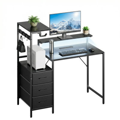 Escritorio para juegos con soporte para monitor y unidad de almacenamiento, con iluminación LED, enchufes integrados y puertos de carga USB, escritorio para computadora de oficina en casa de 120 cm de