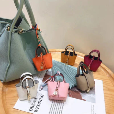 Mini bolso colgante llavero accesorio colgante billetera cero pulsera portátil creativa bolsa para auriculares Bluetooth multifuncional