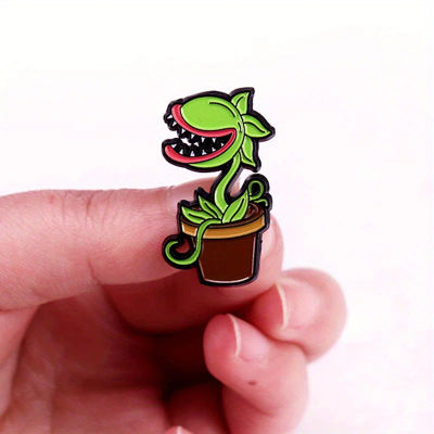 Broche de flor de caníbal verde, accesorio de insignia de planta divertida