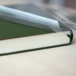 filmolux 610, Buchschutzfolie selbstklebend, für klebstoffabweisende Bucheinbände, glänzend, sehr hohe Anfangsklebkraft 4 cm | 50 m