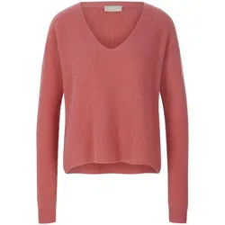 Le pull include fuchsia