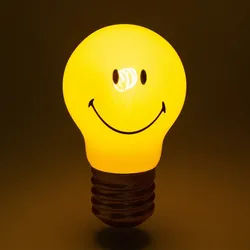 LED-Deko-Glühbirne Smiley MAGS gelb, 12 cm