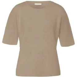 Le pull include vert