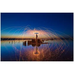 Wallario Küchenrückwand Feuerkreise am Wasser, (1-tlg) gelb 90 cm x 60 cm