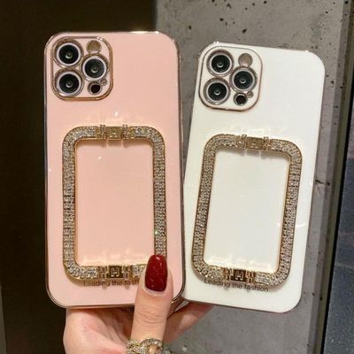 iPhone 13 -kotelon kahva, jossa on strassitimanttijalusta musta valkoinen pinkki