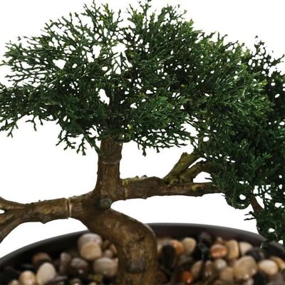 Kunstigt bonsai træ i en sort potte