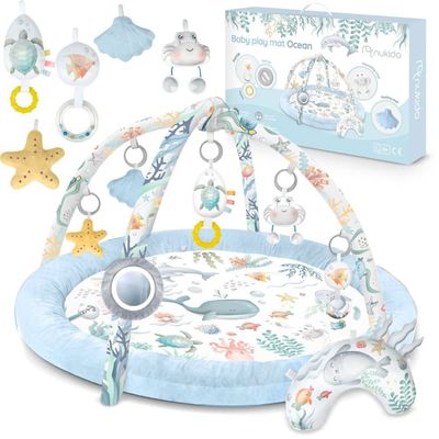 Interaktiv Babymåtte Ocean⭐⭐⭐⭐⭐ for design og komfortVIGTIGSTE FUNKTIONER:- 7 multifunktionelt legetøj- Dedikeret pude til maveposition- Hurtig og nem