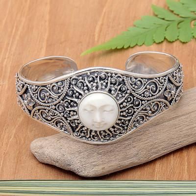 'Sterling Silver Cuff Bracelet with Hand-Carved Sun Motif'