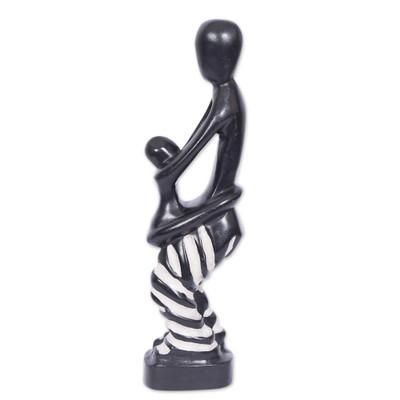 'Hand-Carved Wood Sculpture Featuring a Mother and a Child'