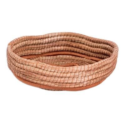 'Handwoven Star-Themed Natural Fiber Basket in Brown Hues'