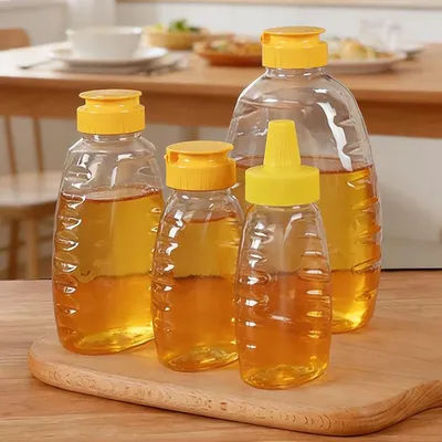 Transparent Reusable Plastic Honey Bottles Squeeze Honey Bottle Container Holder With Lid For Storing And Dispensing Honey Jar
