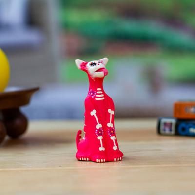 'Hand-Painted Pink and Ivory Ceramic Skeleton Dog Sculpture'