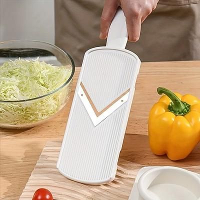 Affettatrice e trita-cavolo resistente con impugnatura ergonomica, taglia e trita-verdure professionale per carote, cetrioli, lattuga, cipolle e verdure a foglia, efficiente per preparare insalate.