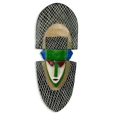 African mask, 'Speak Less'