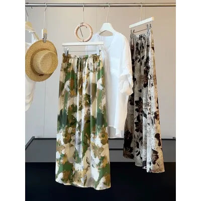 Jupe longue midi fluide et soyeuse à imprimé abstrait vert et marron, taille haute élastique, pour femme, idéale pour la plage et les vacances, style décontracté