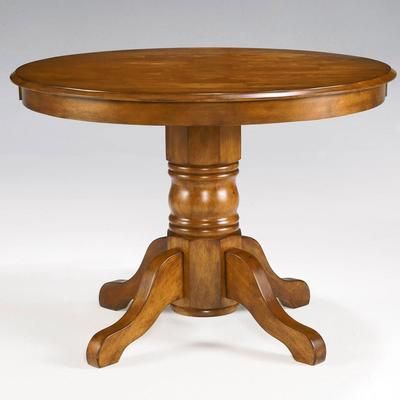 Round Pedestal Dining Table by Homestyles in Oak