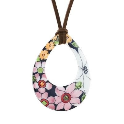 Bursting Blooms,'Ceramic Floral Pendant Necklace on a Faux Suede Cord'
