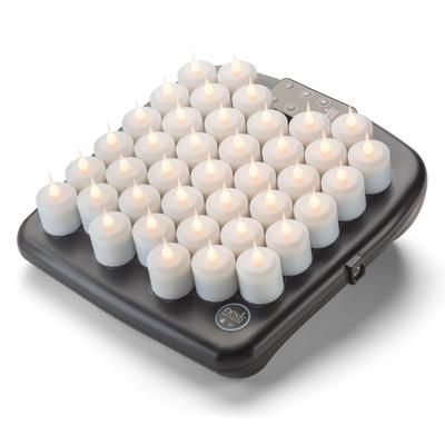 Hollowick HFRX40 1 1/2" Round LED Flameless Votive Candle Set w/ Charging Tray - 2 3/10" H, Candlelight Flame, 26-hr. Operating Time, Magnetic Remote