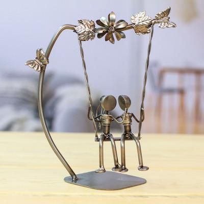 'Eco-Friendly Recycled Auto Part Statuette of Couple in Swing'