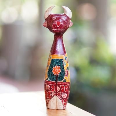 'Handcrafted Batik Painted Deer-Themed Pule Wood Sculpture'
