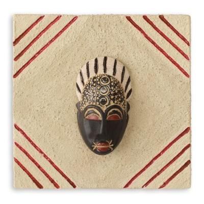 African mask plaque, 'Born on Thursday'