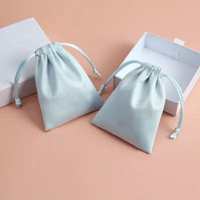 50pcs 7x9cm Light Blue Flannel Drawstring Packing Jewelry Packaging Display Luxury Velvet Suede Pouches Wedding Favors Gift Bags