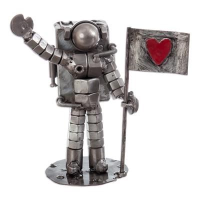'Eco-Friendly Recycled Metal Sculpture of Astronaut and Flag'
