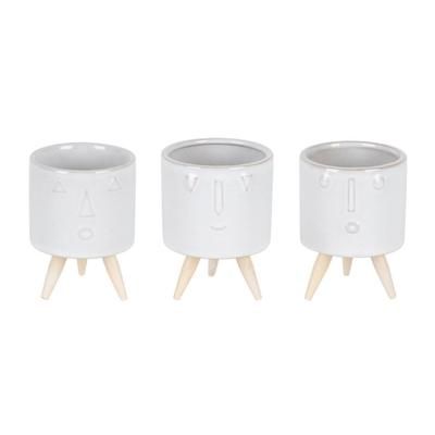 Porcelain Face Planter with Wooden Legs (Set of 3) by Melrose in White/brown