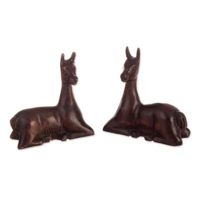'2 Hand-Carved Cedar Wood Figurines of Resting Andean Vicunas'